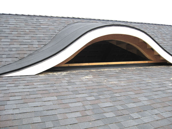   Asphalt shingle roof.